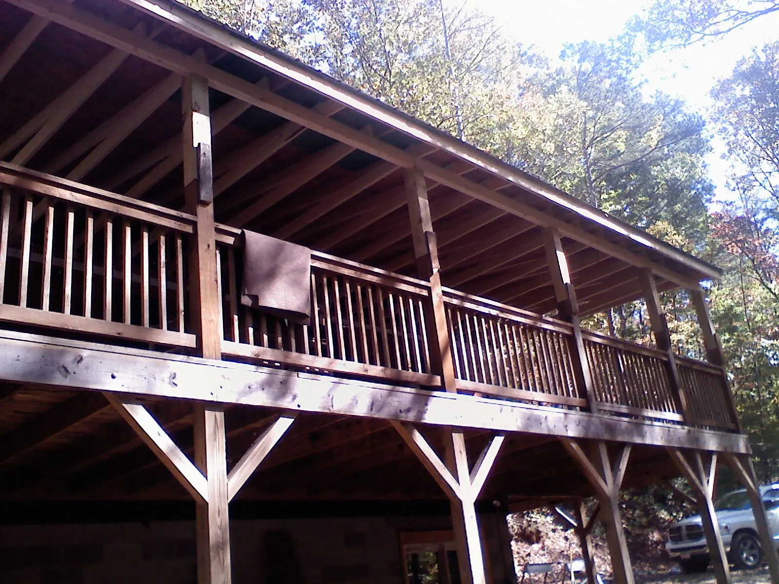 Timber framing under a new elevated porch and deck — Roof Leak Repair in Aredale by Roofing Brothers